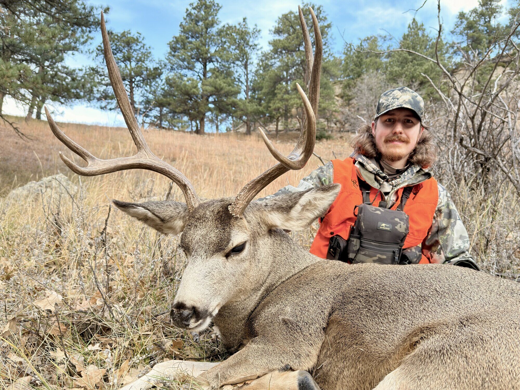 A Baha Outdoors hunter with a Wyoming mule deer