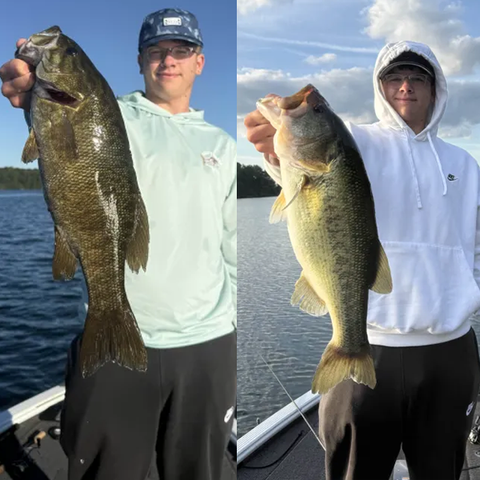 Keenan holding a bass at Merrill Creek Reservoir